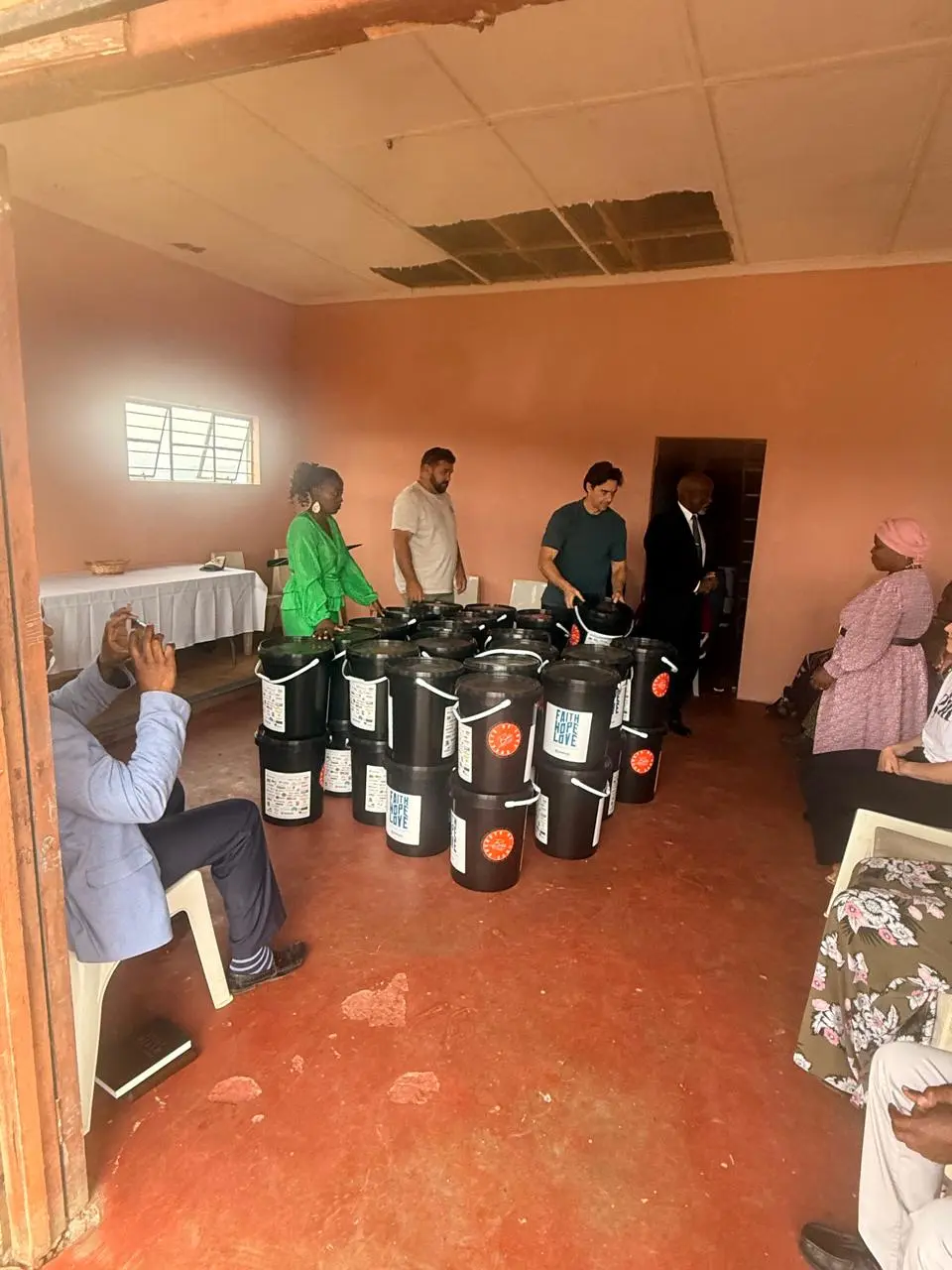 The buckets laid out in the community hall