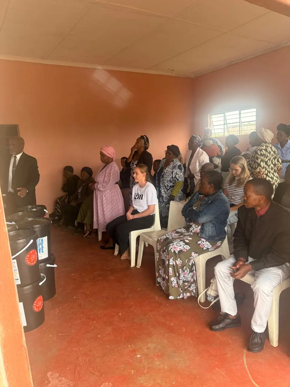 Families seated in the hall