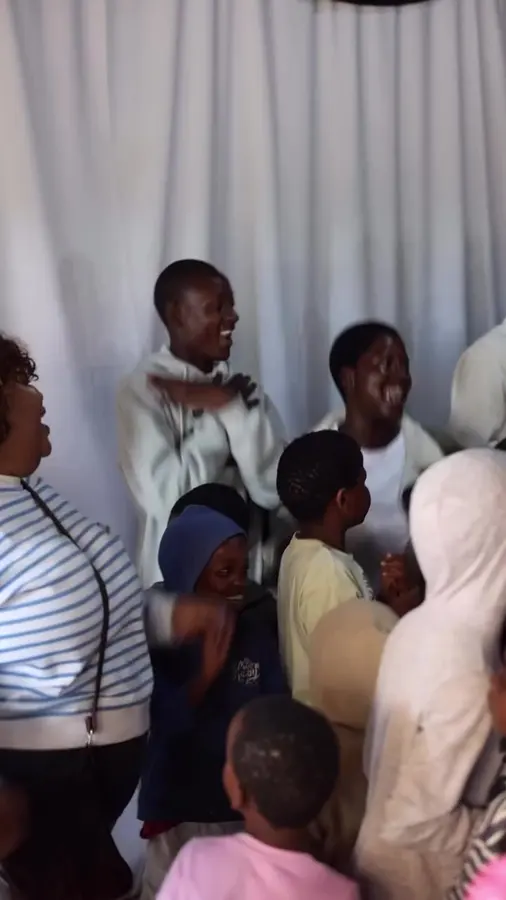 An outreach gathering: worship, prayer and ministry under the marquee